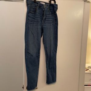 Dark wash high waist skinny jeans w/ fray ankle